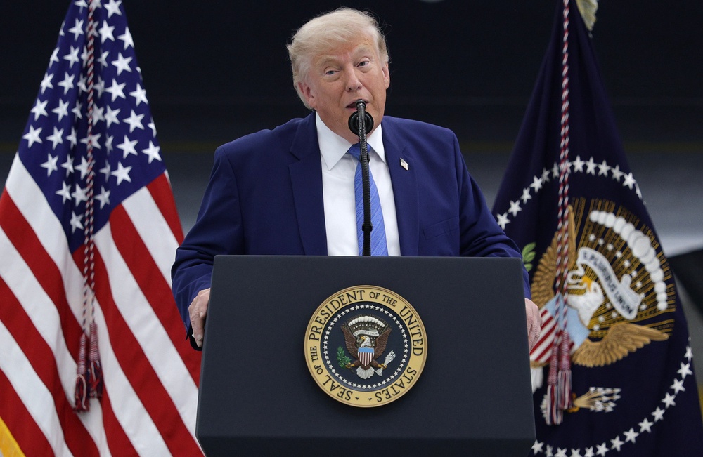 Trump speaks to service members at Joint Base Andrews in Maryland on Friday (Getty)