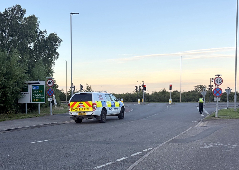 Police close a road in Bedford (Jordan Reynolds/PA) (PA Wire)
