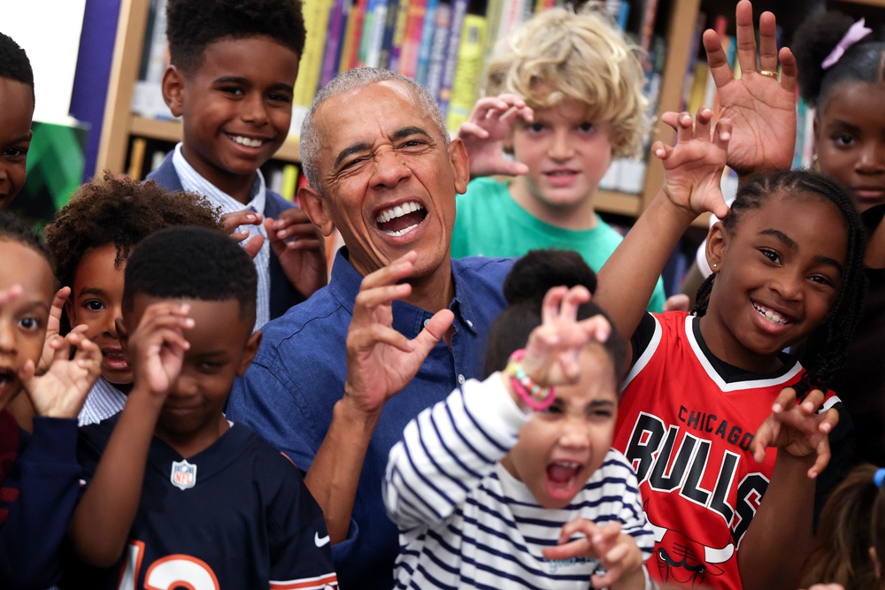 The Obamas delighted 25 schoolchildren at the center's Chicago Public Library branch by reading Maurice Sendak's classic ‘Where the Wild Things Are’ (Win McNamee/Pool Foto via AP)