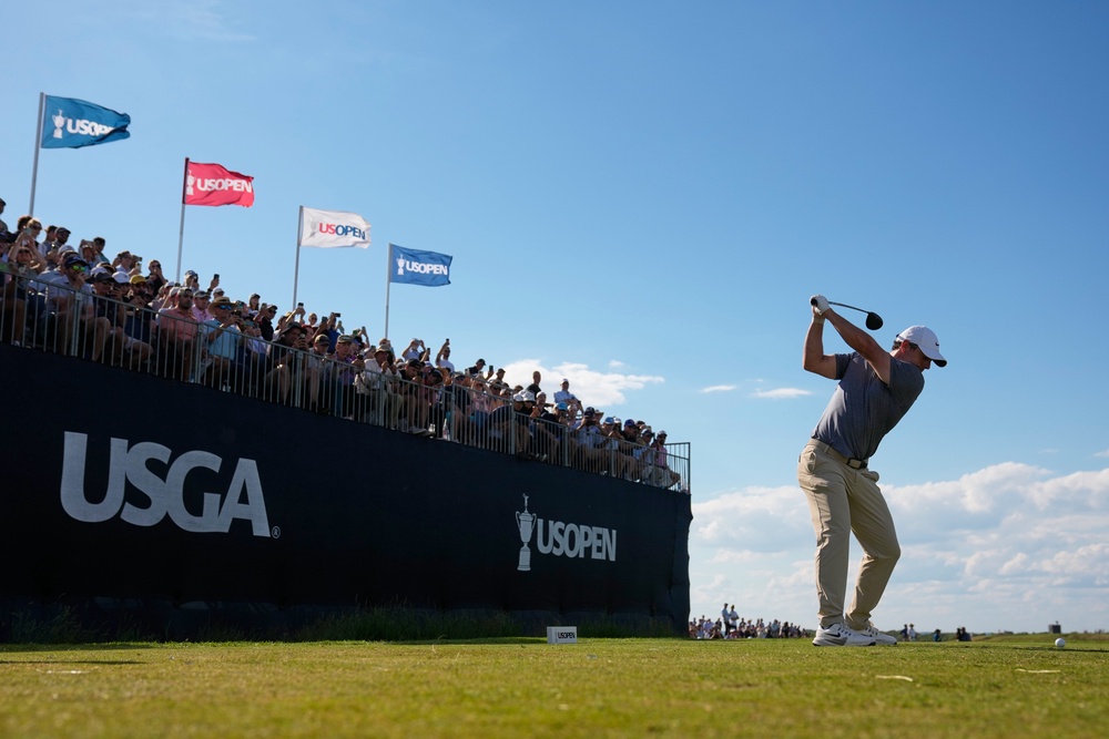 Rory McIlroy hits his tee shot on the 12th hole during the second round (Seth Wenig/AP) (AP)