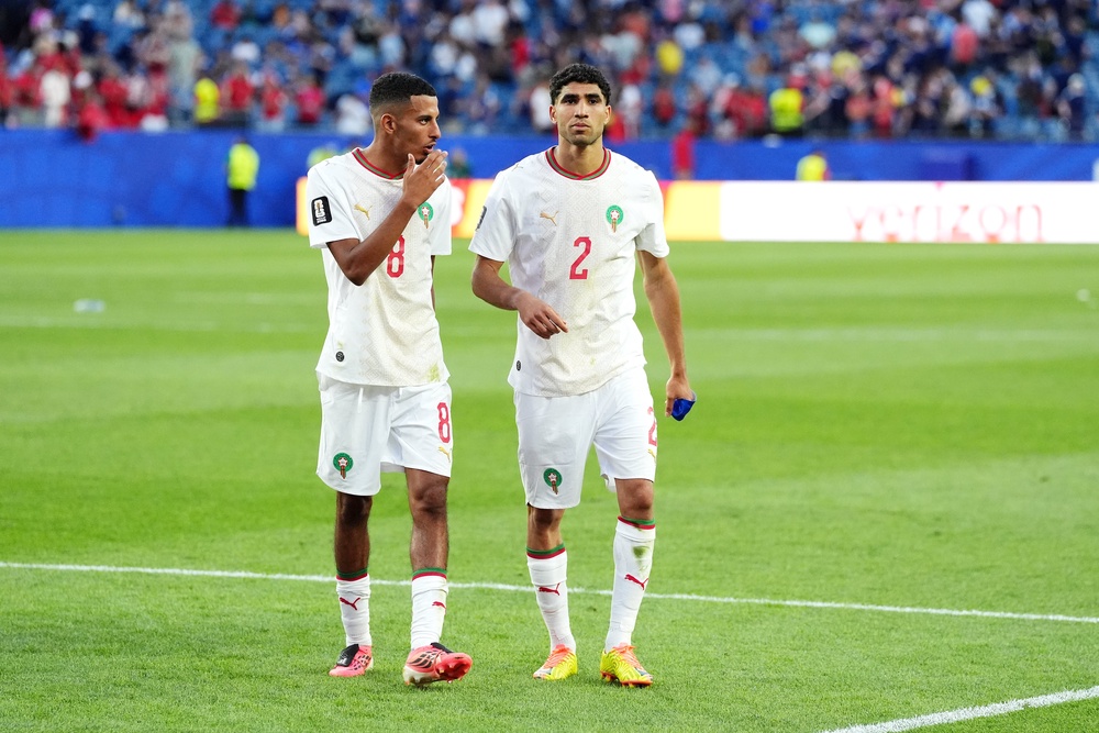 Morocco's Achraf Hakimi (right) and Azzedine Ounahi (PA)