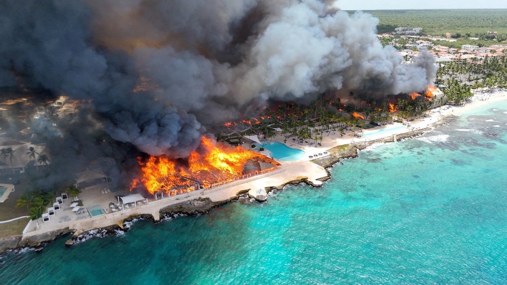 A drone view shows a fire at the Viva Wyndham Dominicus Beach Hotel in Bayahibe, La Altagracia, Dominican Republic, 19 June 2026, in this screen grab obtained from a social media video (Reuters)