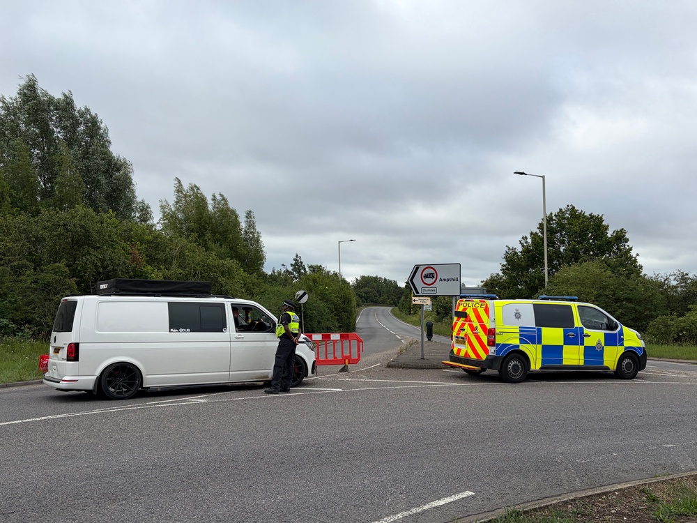 A Police road block on Ampthill Road, Bedford South on Saturday, after two East Midlands Railway (EMR) trains were involved in a collision around 5.15pm on Friday (PA)