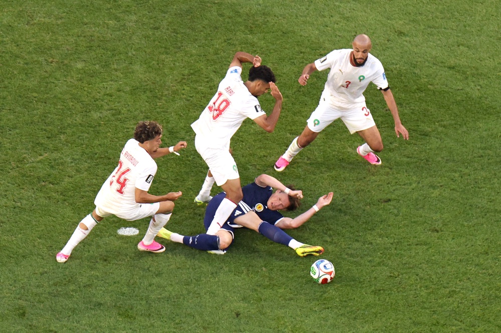 Scott McTominay believed he was fouled by Neil El Aynaoui inside the penalty area but Scotland were not awarded a penalty (Getty)