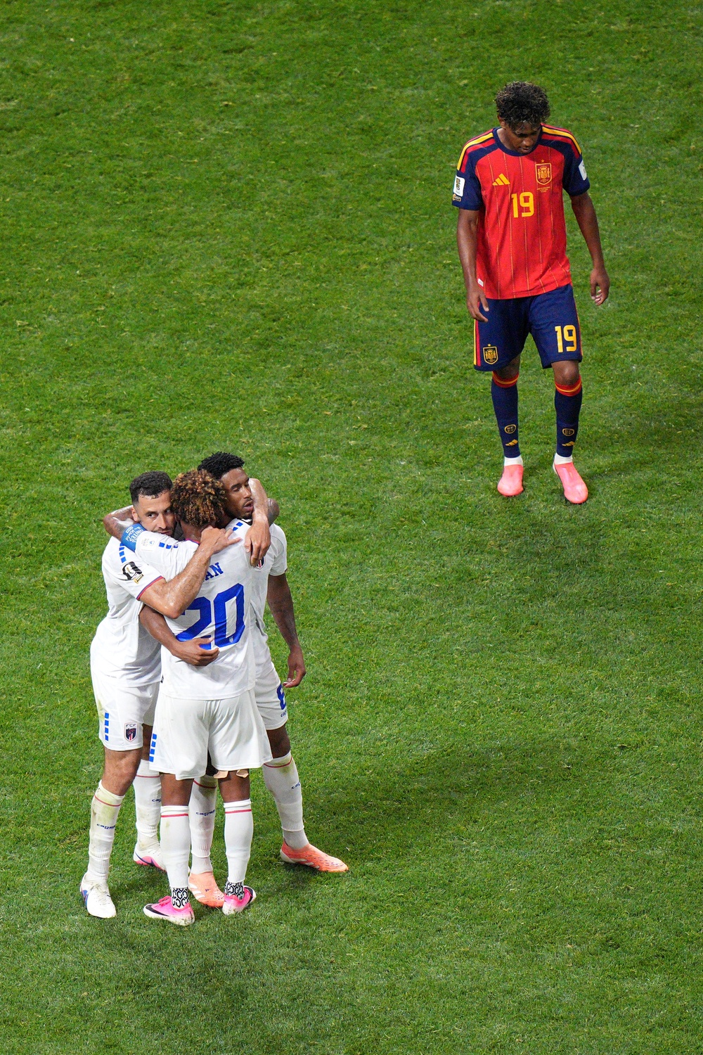 Cape Verde players celebrate while Lamine Yamal hangs his head (Jacob Kupferman/AP) (AP)