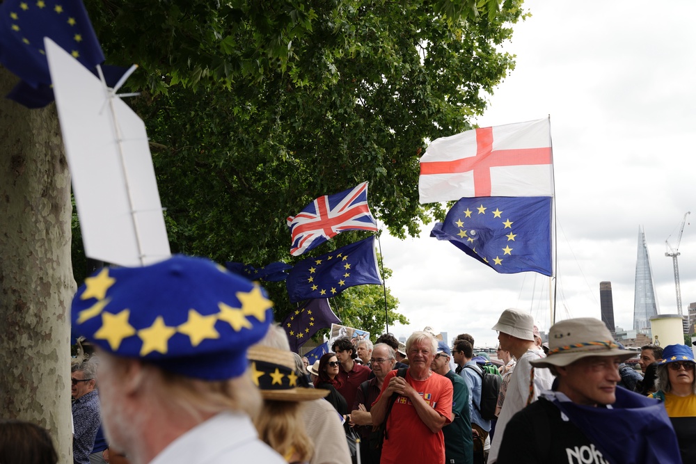 People during a National Rejoin March in London (Jeff Moore/PA)