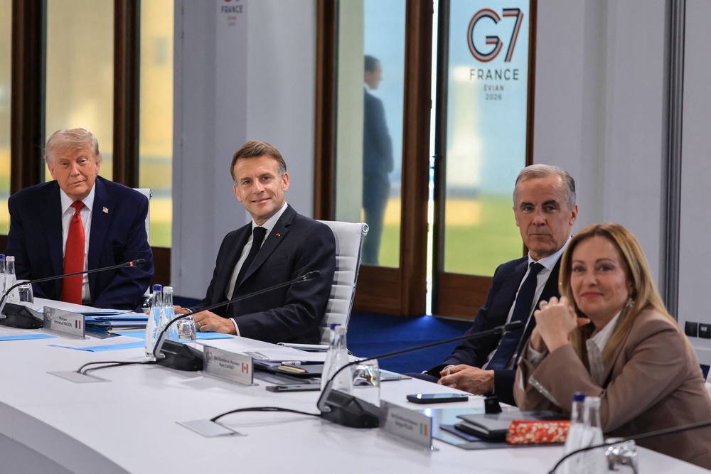 'She begged me for a picture! She wanted a picture with me so badly,' Trump reportedly told an Italian journalist. Pictured: Trump and Meloni sit alongside French President Emmanuel Macron and Canadian Prime Minister Mark Carney at the G7 Summit (AFP via Getty Images)