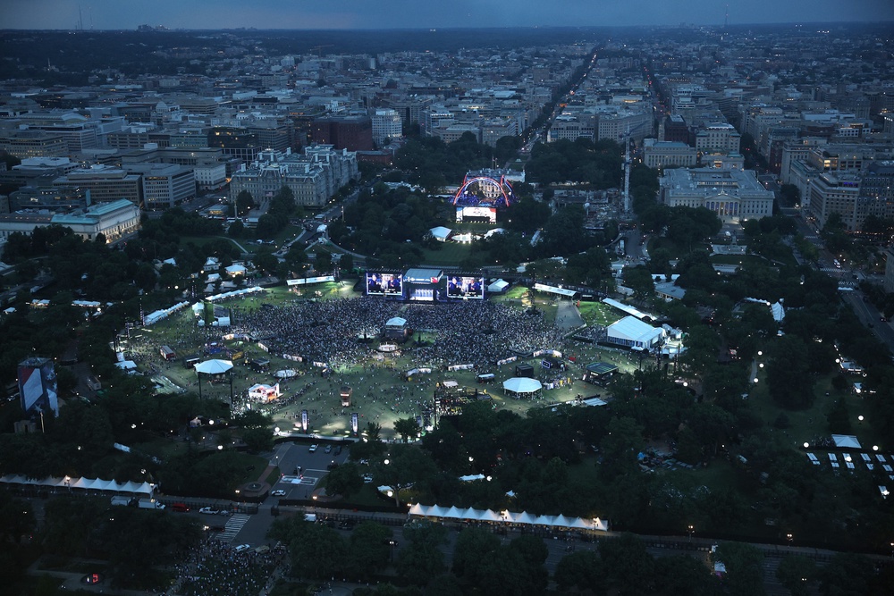 Thousands of viewers filled into the public park to watch fighters duke it out on jumbo screens (POOL/AFP via Getty Images)