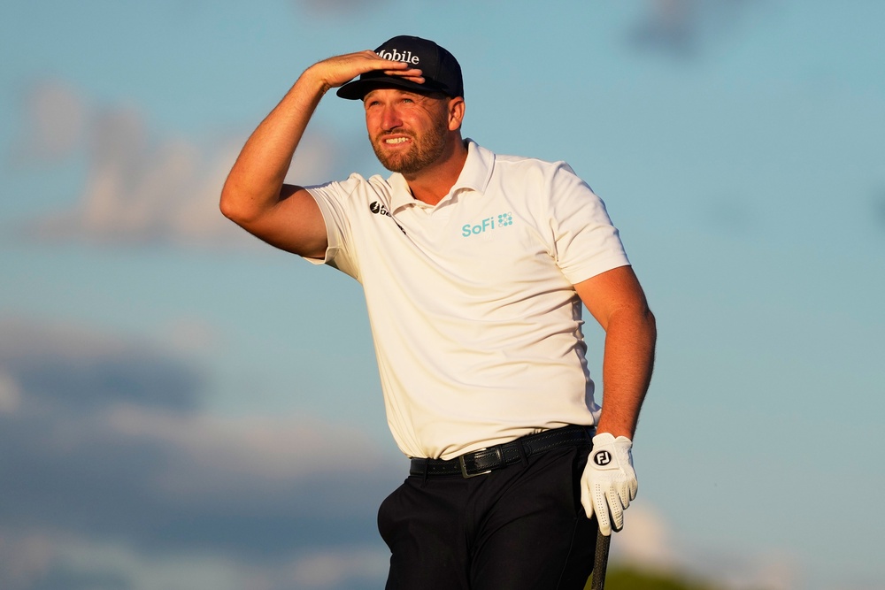 Wyndham Clark watches his tee shot on the 17th (David J Phillip/AP) (AP)