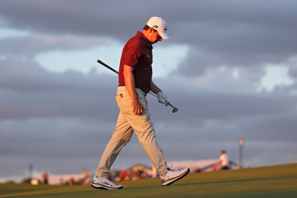 Matthew Fitzpatrick of England walks the 18th green after a disappointing day (Getty)