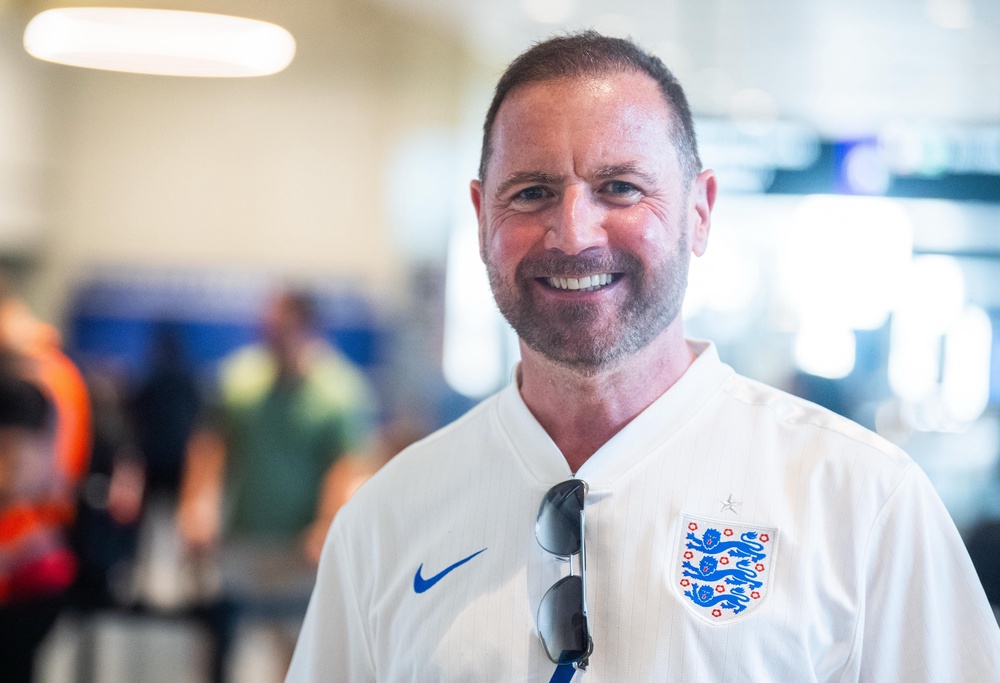 England fan Kieron Matthews poses for a photo in Boston Logan International Airport (James Manning/PA) (PA Wire)
