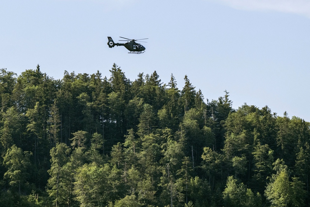 A Swiss Army helicpoter flies over the Buergenstock resort, near Lucerne, Switzerland, on June 21, 2026 ahead of high-level talks aimed at advancing a deal to end the Middle East conflict (AFP/Getty)
