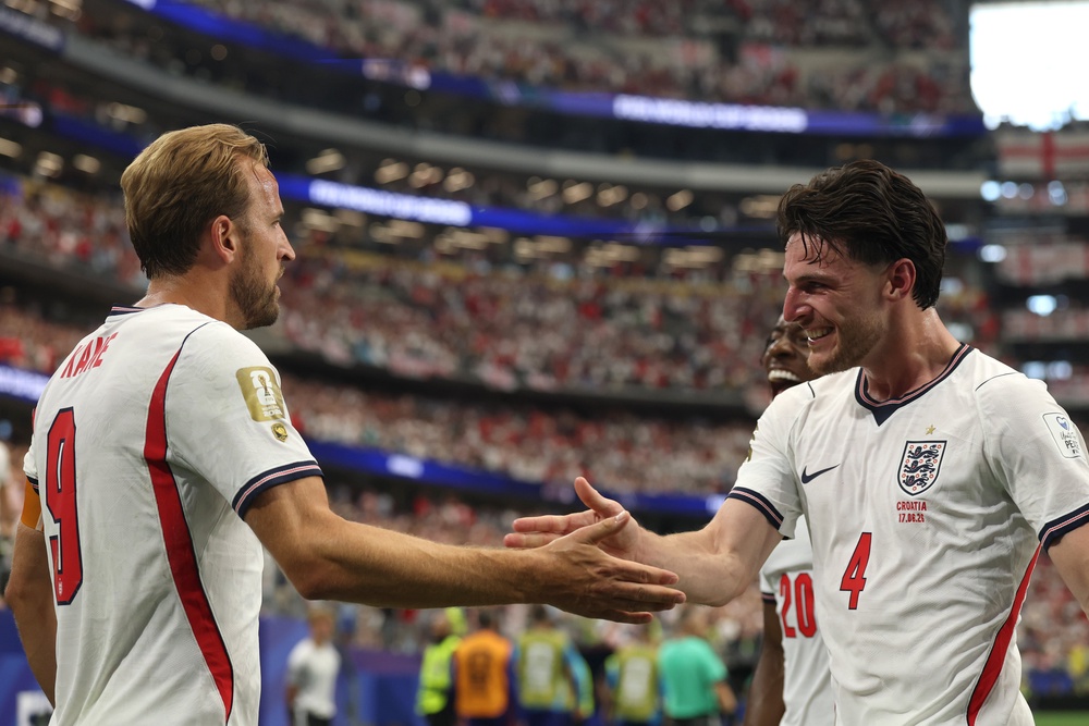 Harry Kane and Declan Rice celebrate England’s second goal against Croatia (Getty)