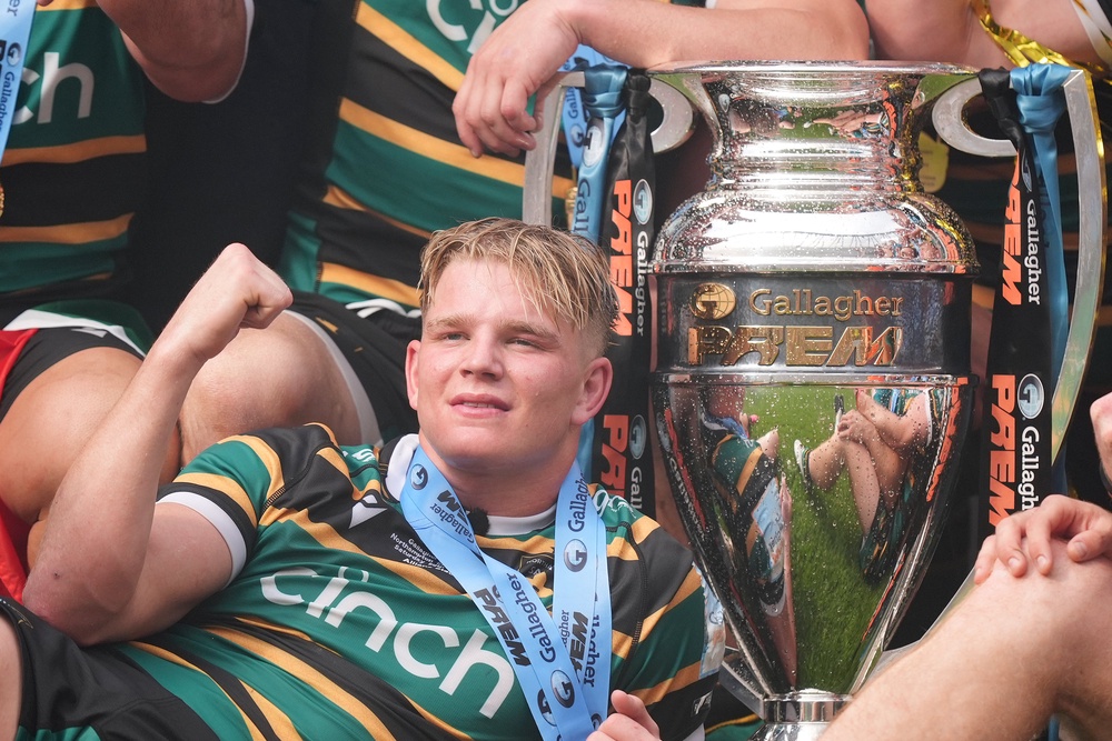 Pollock celebrates with the Gallagher Prem trophy (PA)