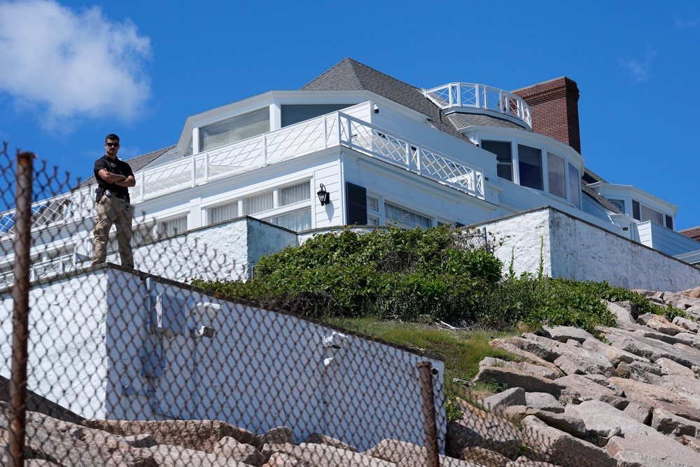 A security guard stands watch at Taylor Swift's 'Holiday House' (AP)