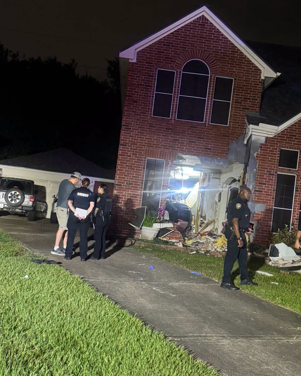 The Tesla crashed into the kids' playroom, Jennifer Barbour said (Harris County Constable's Office Precinct 5)