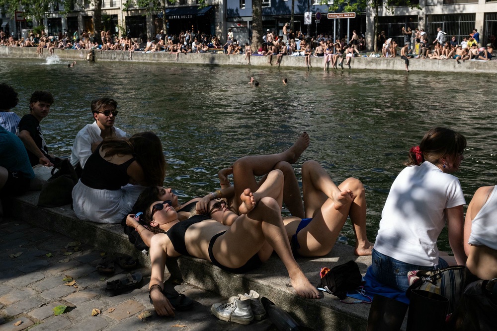 France officials announced the highest heatwave warning Sunday as temperatures reach scorching levels (AFP via Getty Images)