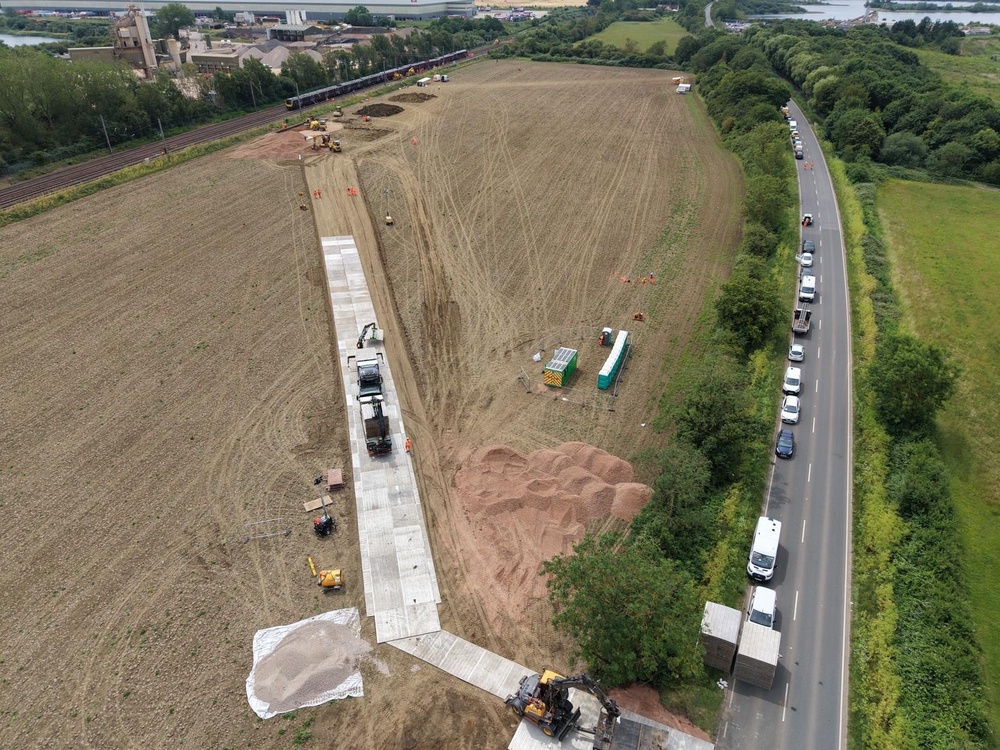 Work to build a temporary access road and concrete foundation to support the operation of a crane in the recovery of the East Midlands Railway trains involved in the crash near Bedford (Network Rail/PA) (PA Media)
