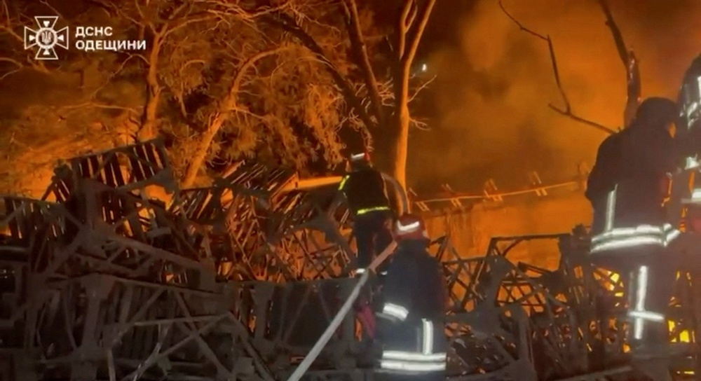 Firefighters work at the site of a Russian strike, amid Russia's attack on Ukraine, at a location given as Odesa Region (Reuters)