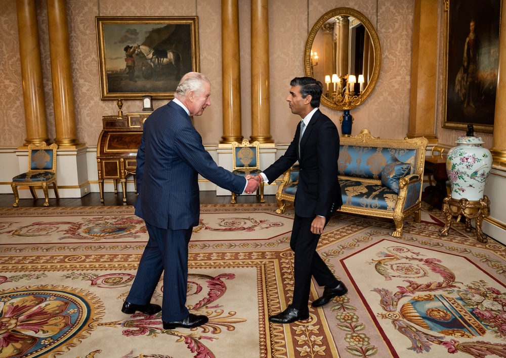 The King shakes hands with Rishi Sunak in 2022 as he invites him to become prime minister as the Conservatives’ new leader (Aaron Chown/PA) (PA Archive)