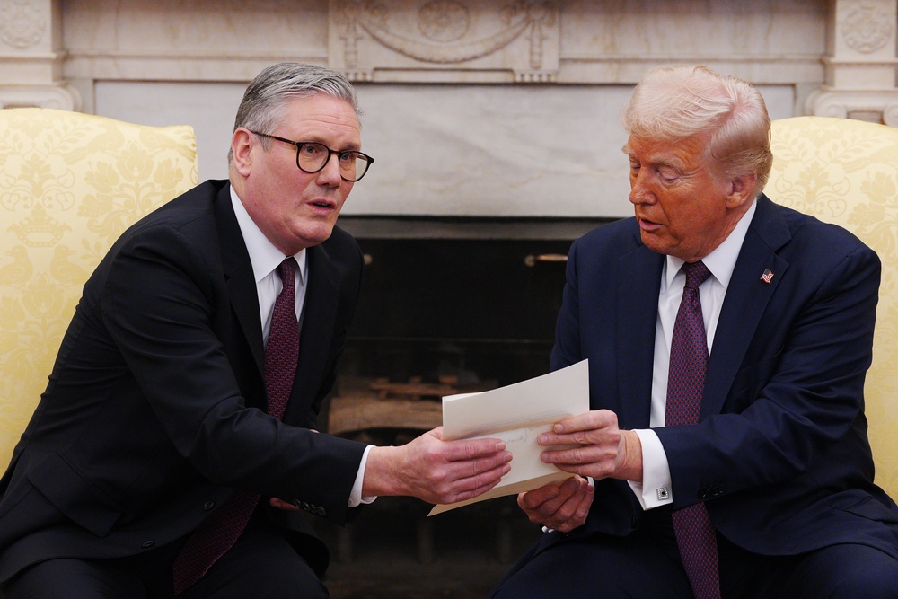 Sir Keir presented the president with a handwritten invitation from the King (Carl Court/PA) (PA Archive)