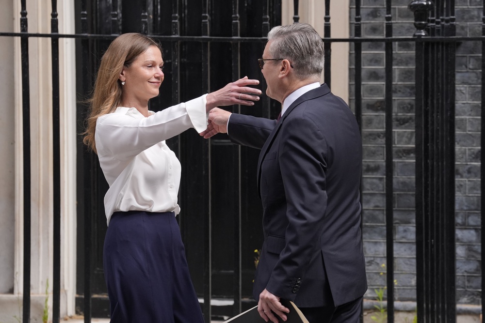 Sir Keir Starmer and his wife Lady Victoria Starmer embraced following the Prime Minister’s speech (Andrew Matthews/PA) (PA Wire)