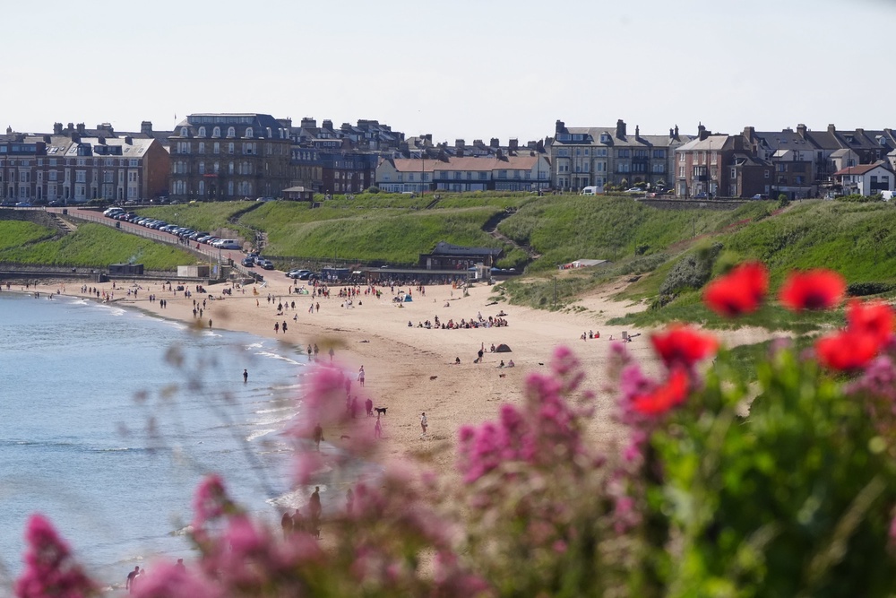 People on Tynemouth Beach in the North East of England (Owen Humphreys/PA) (PA Wire)