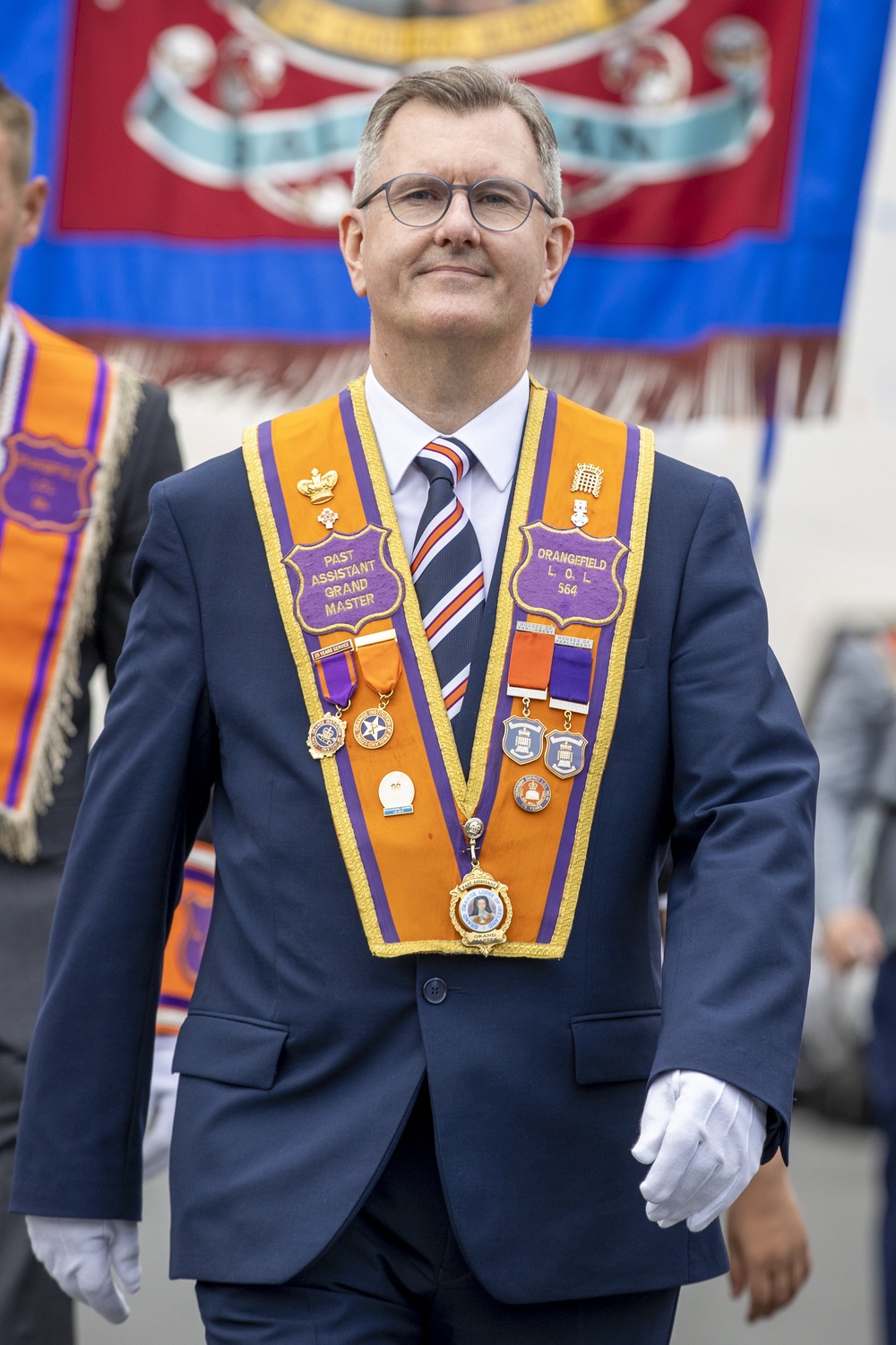 Donaldson marching as a member of Ballinran Orange Lodge through Kilkeel, Co. Down, as part of the annual Twelfth of July celebrations in 2021 (PA) (PA Archive)