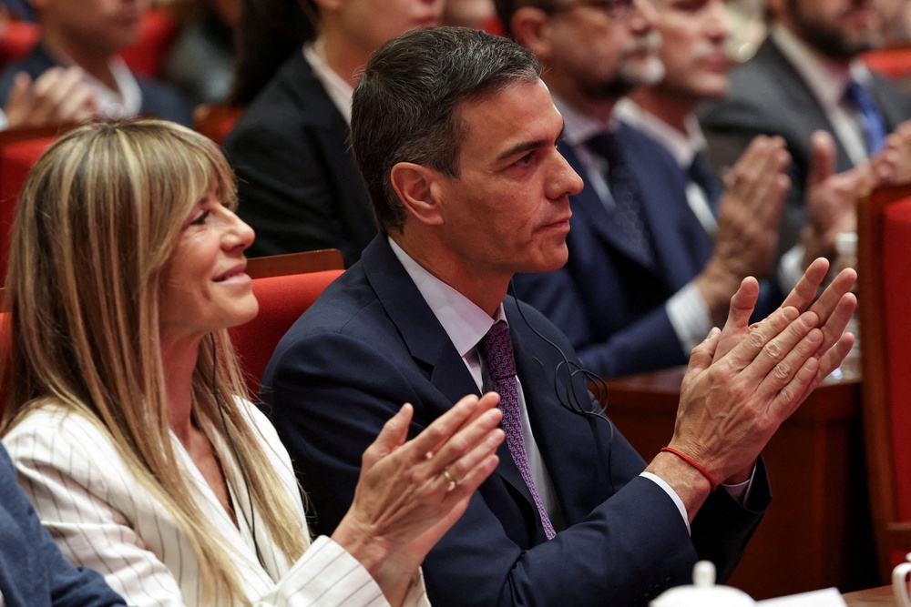 Pedro Sanchez (R), and his wife Begona Gomez, in Beijing in April, amid scrutiny over her conduct (Reuters)