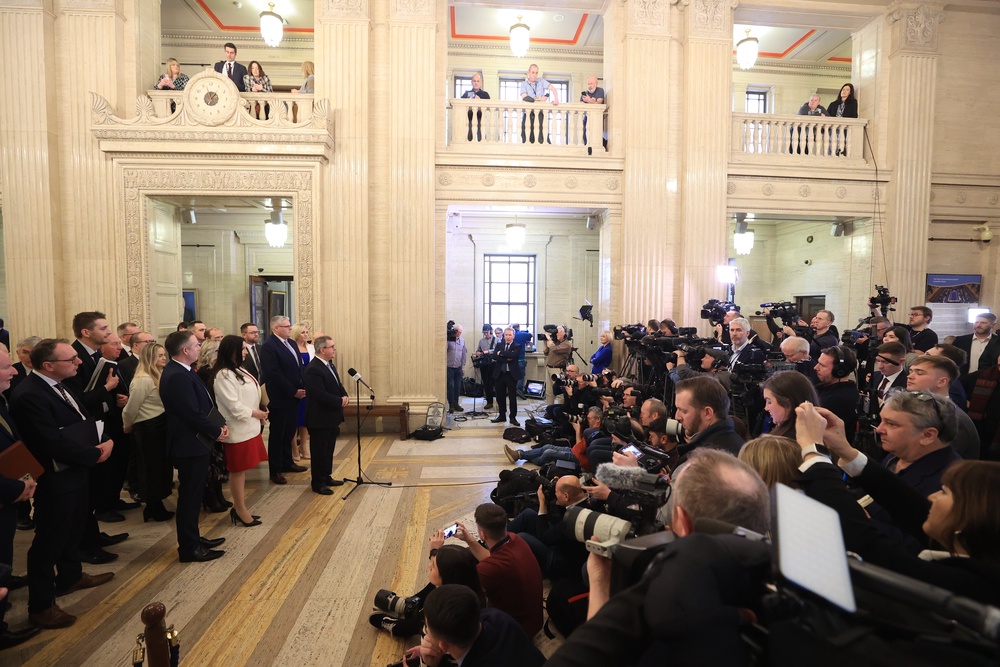 Donaldson speaking to the media in the Great Hall at Parliament Buildings in February 2024 on the day he took his party back into powersharing government in Northern Ireland (PA) (PA Archive)