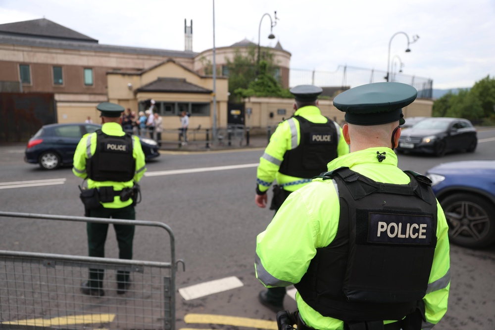 PSNI officers outside Newry Crown Court, where former DUP leader Sir Jeffrey Donaldson was found guilty of 18 historical sex offences (Liam McBurney/PA) (PA Wire)