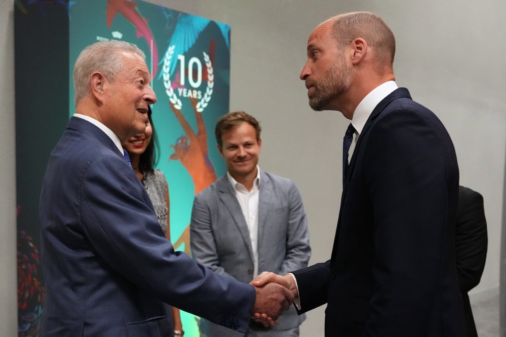 The Prince of Wales shook hands with former US vice president Al Gore at the forum (Kirsty Wigglesworth/PA) (PA Wire)