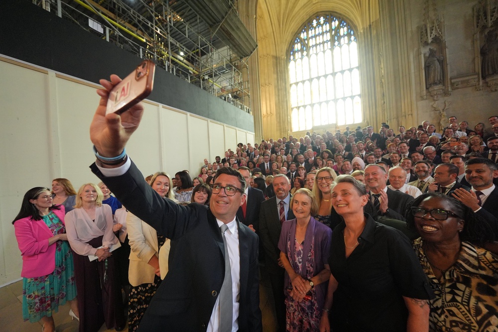 Burnham was joined by almost all Labour MPs for pictures in Westminster Hall (PA)