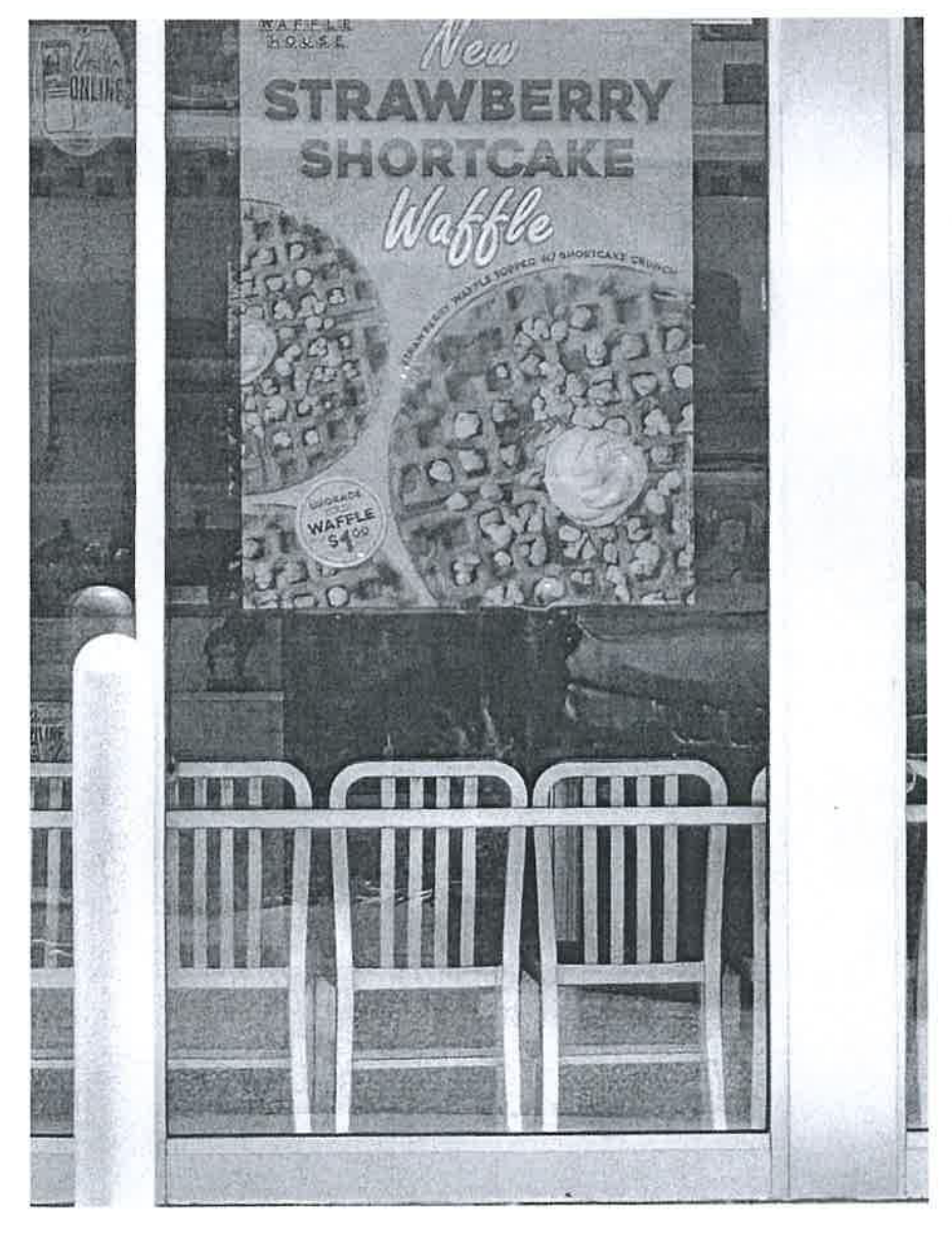 Edward Bowlds was distracted by an ad for a limited-edition Strawberry Shortcake Waffle and severely injured himself when he tripped over an elevated curb, according to court filings (U.S. District Court for the Middle District of Florida)