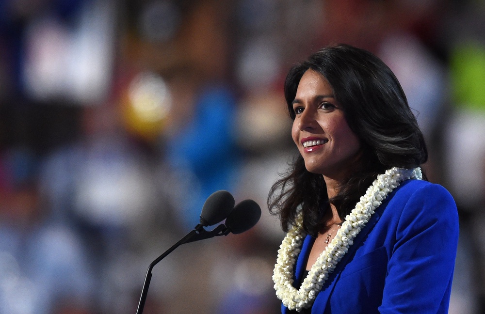Syria was allegedly the subject of ‘many’ of the memos, and one consisted of tactical advice that later became one of Gabbard’s signature policies—urging the U.S. not to oust former Syrian President Bashar Assad, whom she met in 2017 (AFP/Getty)