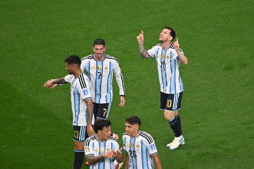 Lionel Messi celebrates scoring against Austria (AP)