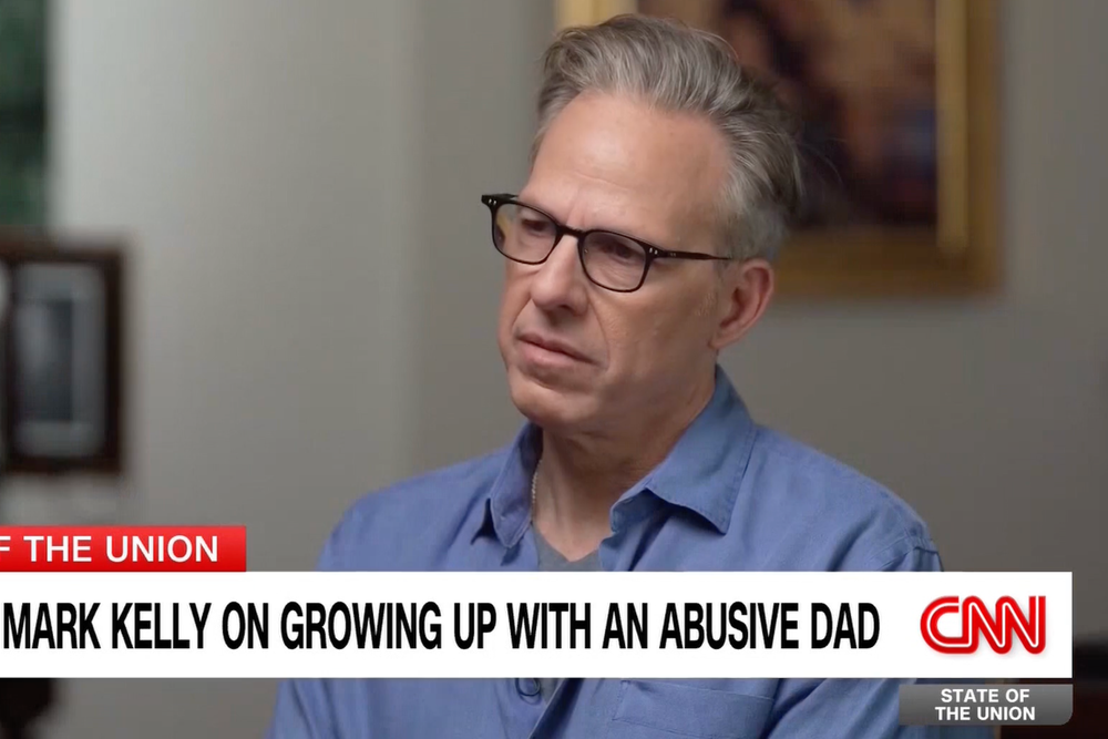 Jake Tapper appeared visibly moved by Kelly's revelations about the domestic violence he witnessed growing up in West Orange, New Jersey (CNN)