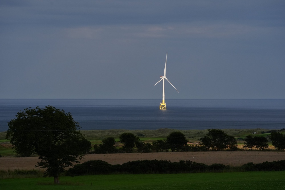 Britain gets electricity from different sources, including wind turbines (Jane Barlow/PA) (PA Archive)