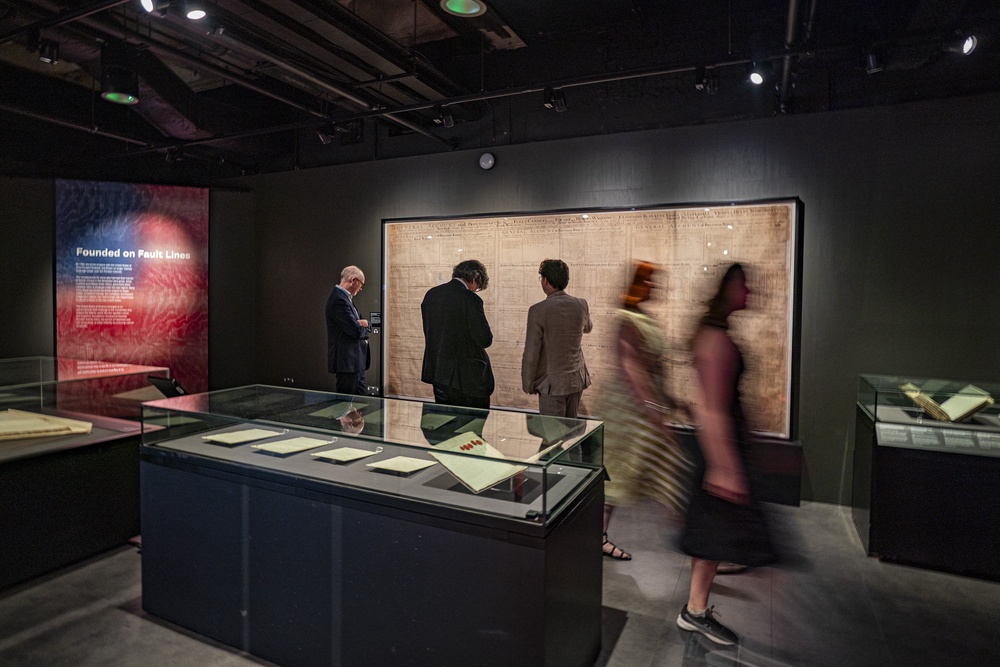 People look at artefacts during a press preview of Revolution 250: America’s Independence Story, 1763-1783 at the National Archives, in Kew (Ben Birchall/PA) (PA Wire)