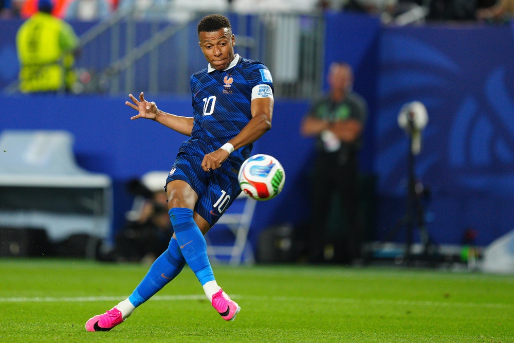 Mbappe had chances to complete his hat-trick but could only fire wide and straight at Ahmed Basil (AP)