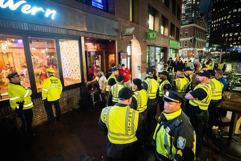 Boston Police Officers outside the White Bull Tavern in Boston (James Manning/PA) (PA Wire)