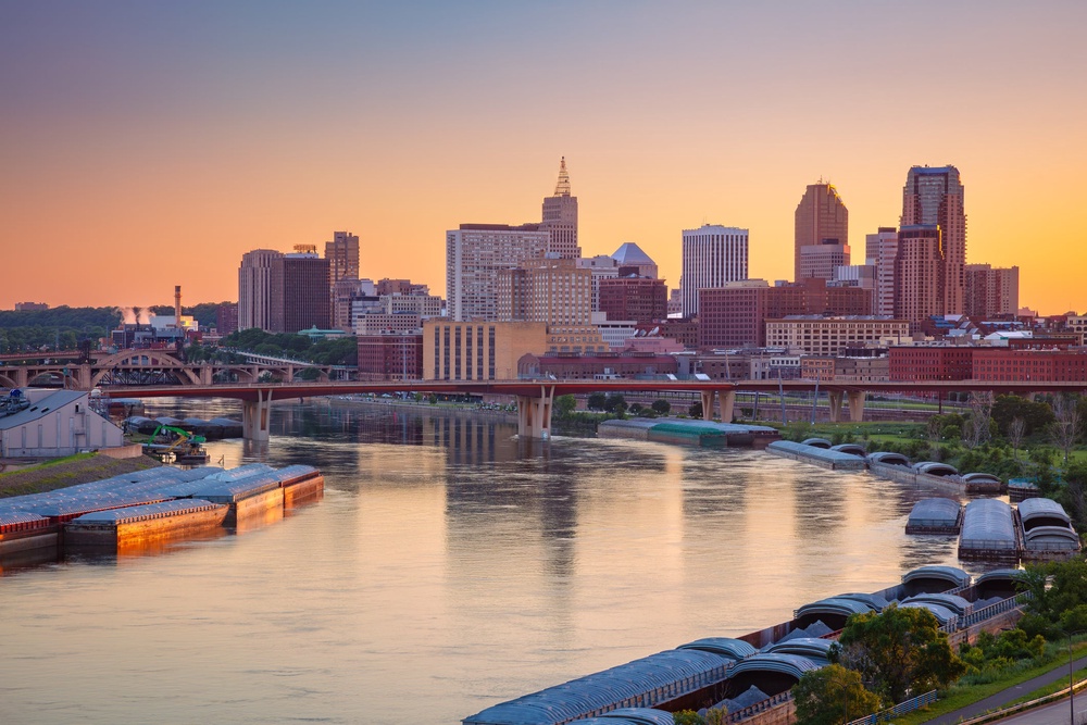 Aerial view of downtown St. Paul, Minnesota, featuring the skyline reflecting in the Mississippi River during a summer sunset. (Getty Images)
