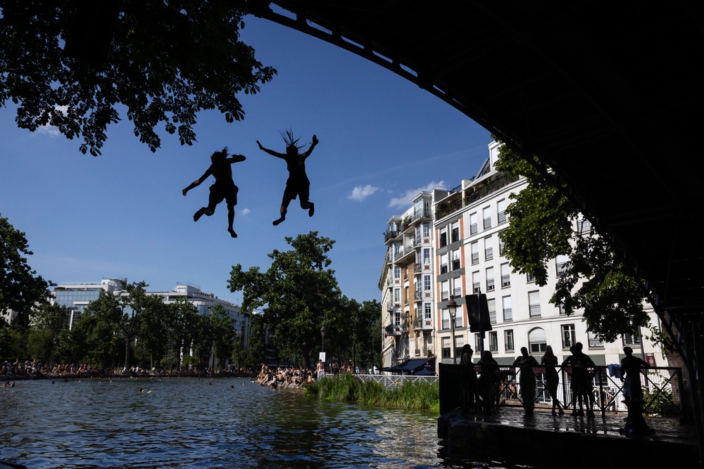 People have been urged to avoid swimming unsupervised as the heatwave sweeps France (AFP/Getty)