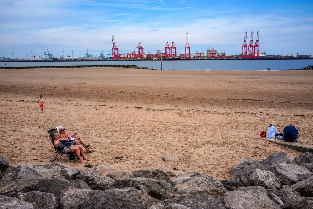 Temperatures are forecast to rise above 30C for several consecutive days. Pictured: New Brighton, Merseyside (Getty)