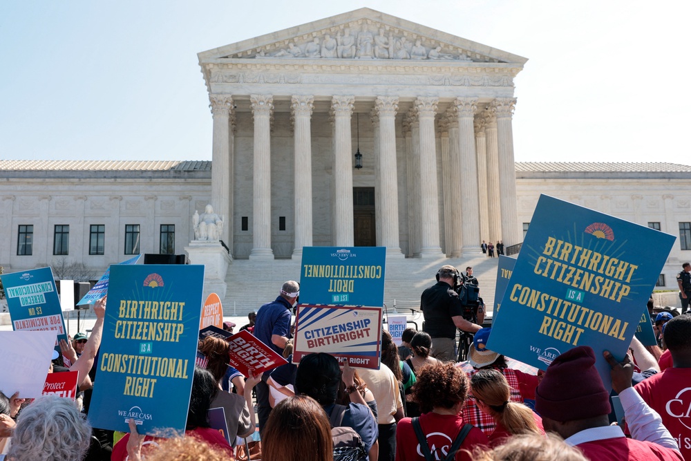 Demonstrators rally in support of birthright citizenship outside the US Supreme Court as President Donald Trump attends oral arguments in Washington, DC on April 1 (AFP/Getty)