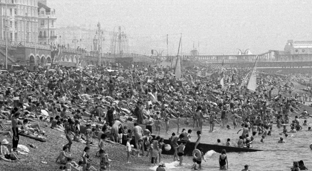 Sunbathers on the beach at Brighton during the summer of 1976 heatwave (PA)