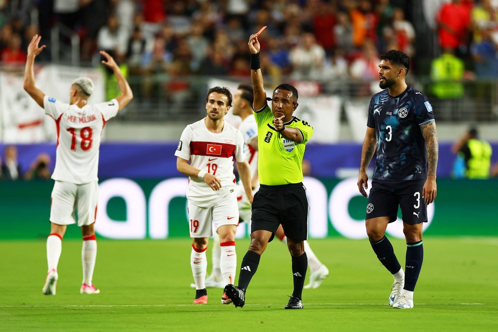 Miguel Almiron was sent off for covering his mouth while speaking to an opponent (Reuters)