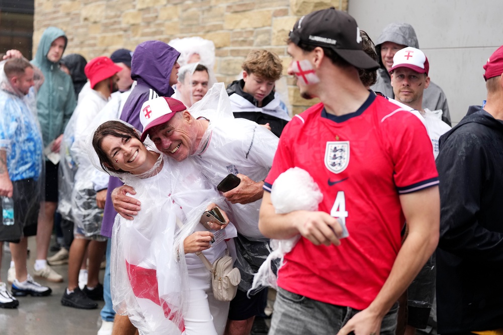 Some England fans pointed out the England-like weather (Nick Potts/PA) (PA Wire)