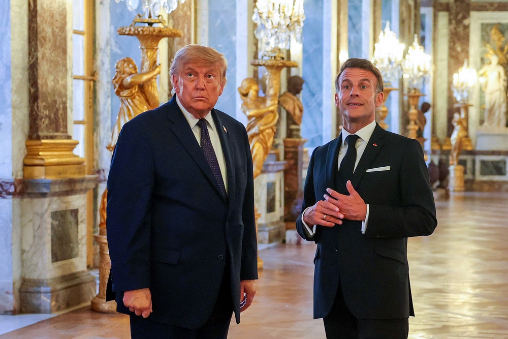 Donald Trump and Macron in Versailles last week (Getty)