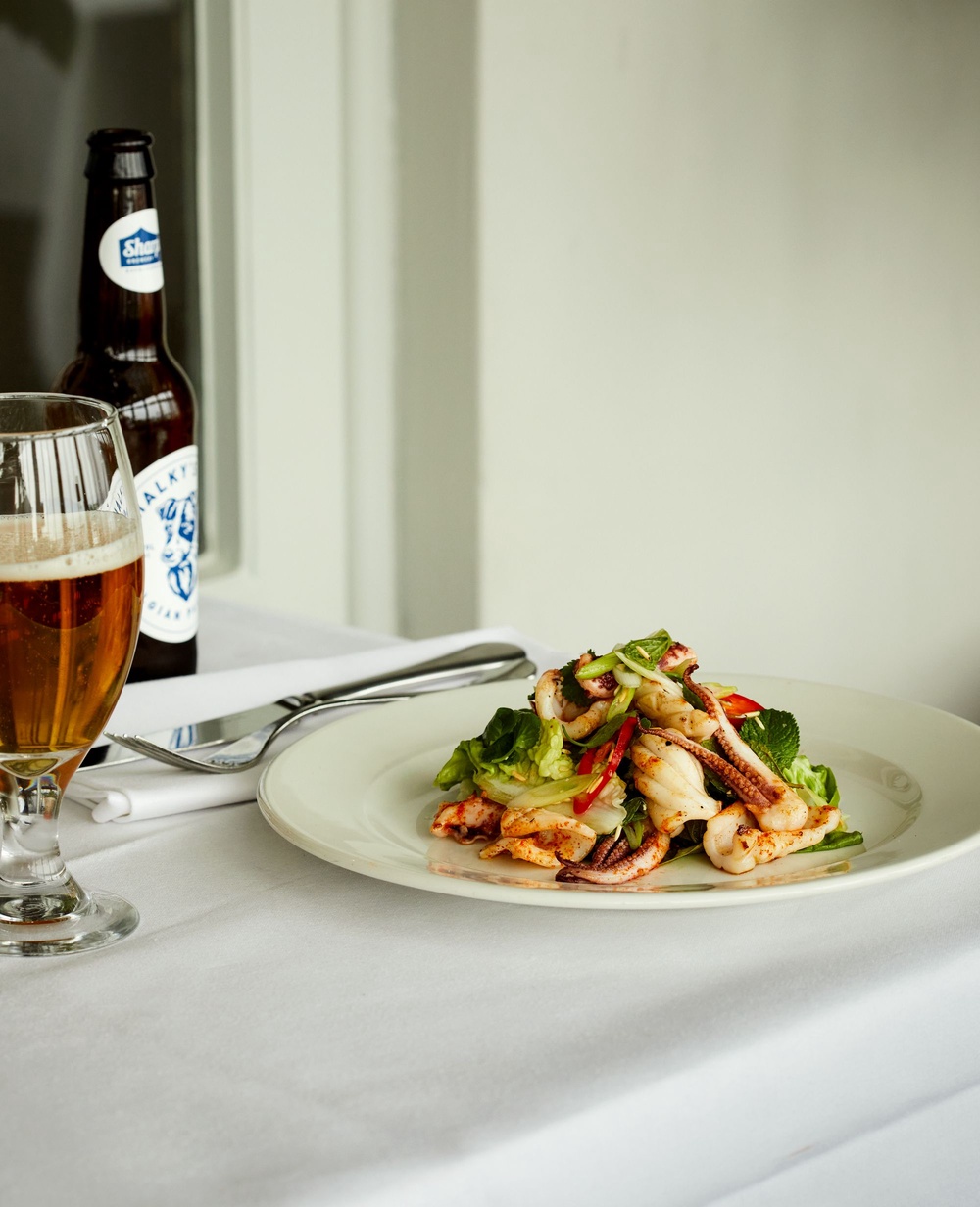 A trip to Thailand in 1986 inspired this Cornish squid dish, bringing chilli, herbs and roasted rice to Padstow long before such flavours were commonplace in Britain (Sam A Harris)
